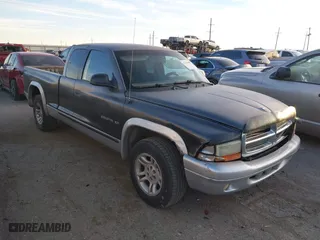 2002 Dodge Dakota SLT with VIN 1B7GL42X42S682184, listed as a IAAI auction lot 41784688 with 168,298 mi miles. Bid and sale history available at carsss.com. Image 1.