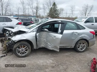 2015 Ford Focus SE with VIN 1FADP3F20FL262380, listed as a IAAI auction lot 42019840 with Not provided miles and . Bid and sale history available at DreamBid. Image 14.