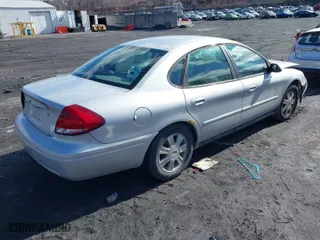 2007 Ford Taurus SEL with VIN 1FAFP56UX7A180336, listed as a IAAI auction lot 41558402 with 135,394 mi miles. Bid and sale history available at carsss.com. Image 4.