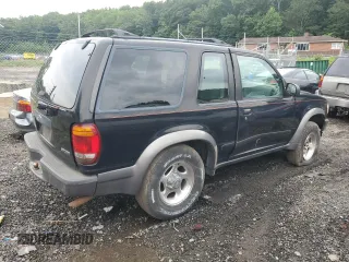 1998 Ford Explorer Sport with VIN 1FMYU24E8WUC31816, listed as a Copart auction lot 64379265 with 245,181 mi miles and Salvage title. Bid and sale history available at DreamBid. Image 3.