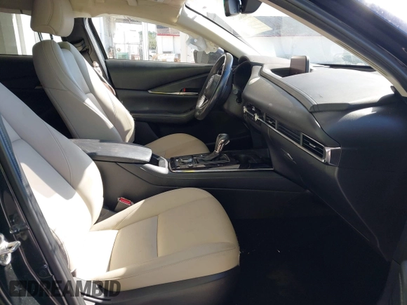2022 Mazda CX-30 2.5 Turbo with VIN 3MVDMBAY3NM440688, listed as a IAAI auction lot 40860258 with 27,445 mi miles and . Bid and sale history available at DreamBid. Image 5.