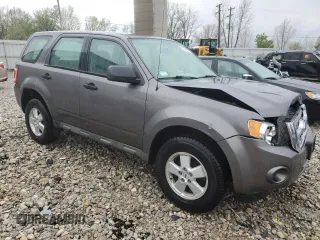 2009 Ford Escape XLS z VIN 1FMCU02799KC31553, wystawiony jako Copart lot #55219775 z przebiegiem 109 154 mil mil oraz Szkoda całkowita • Salvage title. Historia ofert i sprzedaży dostępna na DreamBid. Obrazek 4.