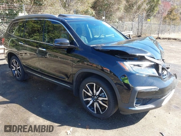2022 Honda Pilot Touring 7-Passenger with VIN 5FNYF6H65NB030018, listed as a IAAI auction lot 41774147 with 57,391 mi miles. Bid and sale history available at carsss.com. Image 1.