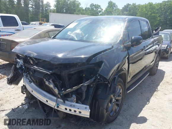 2021 Honda Ridgeline Sport with VIN 5FPYK3F15MB026171, listed as a IAAI auction lot 42265057 with 92,981 mi miles and . Bid and sale history available at DreamBid. Image 2.