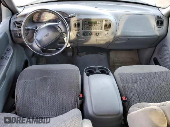 1999 Ford F-150 XL с VIN 1FTRX08L3XKA96271, выставлен на аукционе Copart как лот 49238415 с пробегом 168 477 миль миль и Списание • Salvage title. История ставок и продаж доступна на DreamBid. Изображение 8.