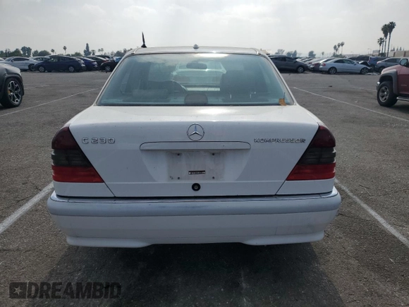 2000 Mercedes-Benz C 230 Kompressor with VIN WDBHA24G1YA820238, listed as a Copart auction lot 55563994 with 264,556 mi miles and Salvage Title. Bid and sale history available at carsss.com. Image 6.