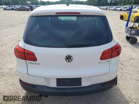 2012 Volkswagen Tiguan SE z VIN WVGAV7AX6CW610234, wystawiony jako Copart lot #57620505 z przebiegiem 71 730 mil mil oraz Czysty tytuł • Clean title. Historia ofert i sprzedaży dostępna na DreamBid. Obrazek 6.