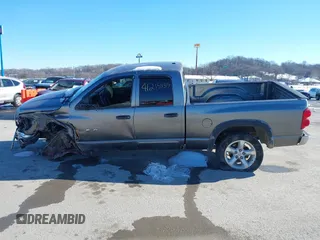 2007 Dodge 1500 SLT with VIN 1D7HU18207J523662, listed as a IAAI auction lot 41215939 with 250,725 mi miles. Bid and sale history available at carsss.com. Image 15.