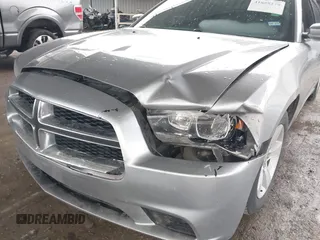 2014 Dodge Charger SE with VIN 2C3CDXBG5EH363292, listed as a IAAI auction lot 41888279 with 129,128 mi miles. Bid and sale history available at carsss.com. Image 6.