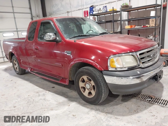 2002 Ford F-150 XL with VIN 1FTRX17L12NA36715, listed as a IAAI auction lot 41850555 with 174,012 mi miles. Bid and sale history available at carsss.com. Image 1.