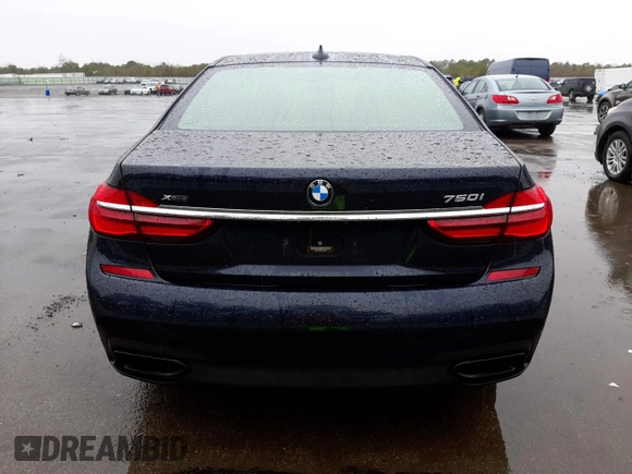 2016 BMW 7 Series 750i xDrive with VIN WBA7F2C58GG416876, listed as a Copart auction lot 37267523 with 77,741 mi miles. Bid and sale history available at carsss.com. Image 6.