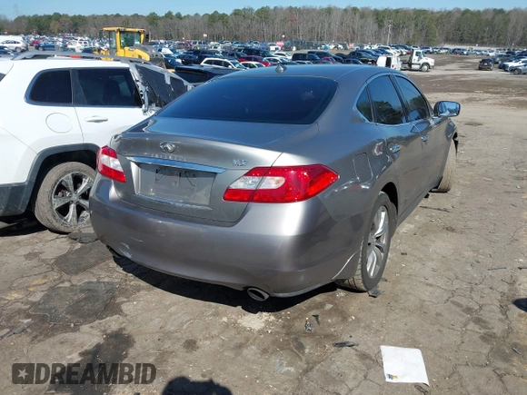 2012 Infiniti M with VIN JN1BY1AP3CM331819, listed as a IAAI auction lot 41773311 with 321,644 mi miles and . Bid and sale history available at DreamBid. Image 4.