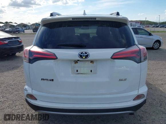 2018 Toyota RAV4 XLE with VIN JTMWFREV7JJ174483, listed as a IAAI auction lot 41597797 with 82,836 mi miles. Bid and sale history available at carsss.com. Image 17.