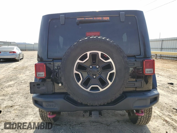2016 Jeep Wrangler Unlimited Rubicon with VIN 1C4HJWFG4GL107777, listed as a Copart auction lot 48974135 with 118,164 mi miles and Salvage Title. Bid and sale history available at carsss.com. Image 6.