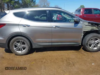 2018 Hyundai Santa Fe Sport 2.4L with VIN 5XYZU3LB5JG571084, listed as a IAAI auction lot 41764986 with 64,148 mi miles. Bid and sale history available at carsss.com. Image 14.