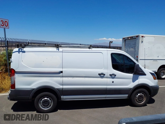 2018 Ford Transit with VIN 1FTYR1YGXJKA37398, listed as a IAAI auction lot 42073096 with 82,140 mi miles and . Bid and sale history available at DreamBid. Image 13.