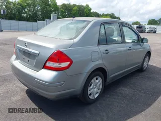 2011 Nissan Versa S with VIN 3N1BC1AP0BL392052, listed as a IAAI auction lot 42383113 with 198,633 mi miles and . Bid and sale history available at DreamBid. Image 4.