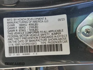2023 Honda Civic EX-L z VIN 19XFL1H72PE010913, wystawiony jako Copart lot #51608005 z przebiegiem 35 961 mil mil oraz Szkoda całkowita • Salvage title. Historia ofert i sprzedaży dostępna na DreamBid. Obrazek 13.