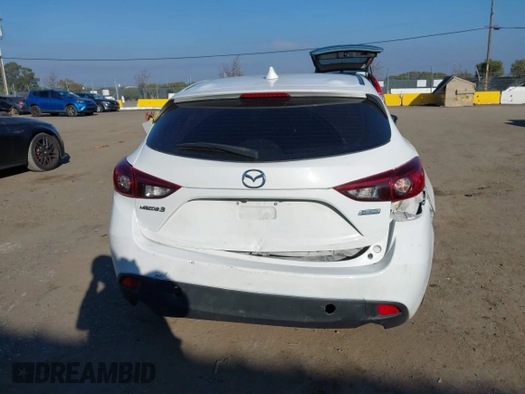2014 Mazda 3 i Grand Touring with VIN JM1BM1M7XE1102093, listed as a IAAI auction lot 41344433 with 148,395 mi miles and . Bid and sale history available at DreamBid. Image 16.