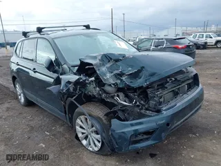 2019 Volkswagen Tiguan S with VIN 3VV0B7AX8KM178139, listed as a IAAI auction lot 41860225 with 97,980 mi miles. Bid and sale history available at carsss.com. Image 1.