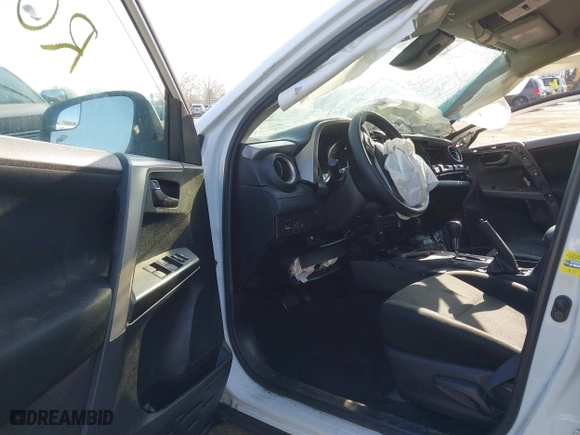 2018 Toyota RAV4 LE with VIN 2T3BFREV5JW854513, listed as a IAAI auction lot 41804823 with 138,476 mi miles. Bid and sale history available at carsss.com. Image 5.