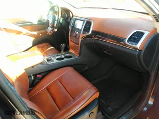 2012 Jeep Grand Cherokee Overland with VIN 1C4RJFCT8CC268410, listed as a IAAI auction lot 41823909 with 205,940 mi miles. Bid and sale history available at carsss.com. Image 5.