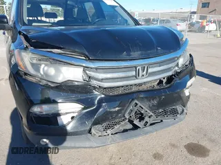 2018 Honda Pilot EX-L with VIN 5FNYF5H58JB013113, listed as a IAAI auction lot 41313206 with 125,825 mi miles. Bid and sale history available at carsss.com. Image 6.