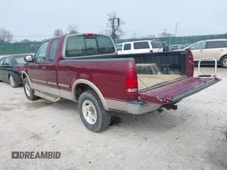 1997 Ford F-150 XL with VIN 1FTEX18L5VNC45344, listed as a IAAI auction lot 41690852 with 205,766 mi miles. Bid and sale history available at carsss.com. Image 3.