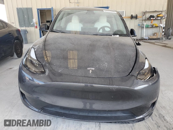 2024 Tesla Model Y с VIN 7SAYGDED3RF044335, выставлен на аукционе Copart как лот 58263265 с пробегом Не указан миль и Списание • Salvage title. История ставок и продаж доступна на DreamBid. Изображение 5.