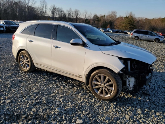 2016 Kia Sorento SXL with VIN 5XYPKDA57GG150301, listed as a Copart auction lot 43777345 with 82,593 mi miles and Salvage title. Bid and sale history available at DreamBid. Image 4.