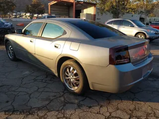 2006 Dodge Charger R/T with VIN 2B3KA53H26H361580, listed as a IAAI auction lot 40874293 with 239,930 mi miles. Bid and sale history available at carsss.com. Image 3.