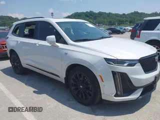 2021 Cadillac XT6 Sport with VIN 1GYKPGRS4MZ222263, listed as a IAAI auction lot 42443907 with 18,353 mi miles and . Bid and sale history available at DreamBid. Image 1.
