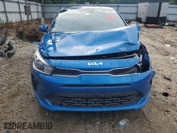 2023 Kia Rio S with VIN 3KPA24AD6PE548027, listed as a Copart auction lot 63697104 with 34,588 mi miles and Salvage Title. Bid and sale history available at carsss.com. Image 5.