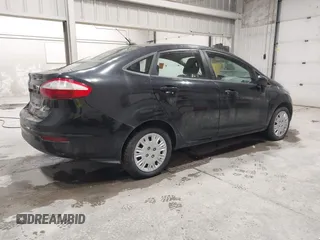 2014 Ford Fiesta S z VIN 3FADP4AJ2EM204157, wystawiony jako IAAI lot #42279297 z przebiegiem 155 374 mil mil oraz . Historia ofert i sprzedaży dostępna na DreamBid. Obrazek 4.