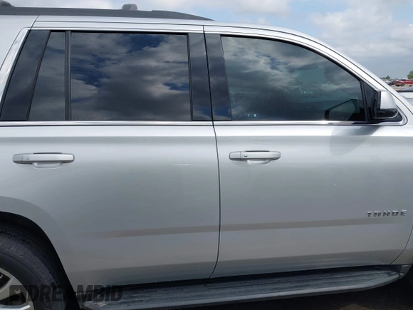 2019 Chevrolet Tahoe LT with VIN 1GNSCBKC7KR326466, listed as a IAAI auction lot 42048492 with 65,913 mi miles and . Bid and sale history available at DreamBid. Image 14.