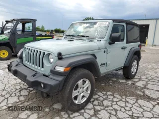 2023 Jeep Wrangler Sport with VIN 1C4HJXAG0PW595881, listed as a Copart auction lot 65590025 with 19,597 mi miles and Salvage title. Bid and sale history available at DreamBid. Image 1.