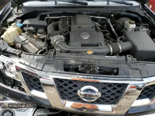 2009 Nissan Frontier SE z VIN 1N6AD09W99C407792, wystawiony jako Copart lot #69202484 z przebiegiem 176 625 mil mil oraz Szkoda całkowita • Salvage title. Historia ofert i sprzedaży dostępna na DreamBid. Obrazek 11.