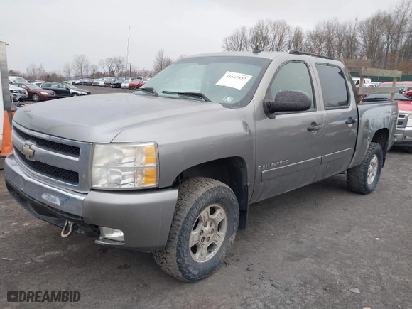 2007 Chevrolet Silverado 1500 LTZ with VIN 2GCEK13M571581790, listed as a IAAI auction lot 41663432 with 184,977 mi miles. Bid and sale history available at carsss.com. Image 2.