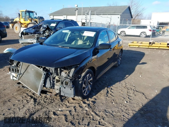 2016 Honda Civic Sedan EX with VIN 2HGFC2F74GH511641, listed as a IAAI auction lot 41843523 with 138,289 mi miles. Bid and sale history available at carsss.com. Image 2.
