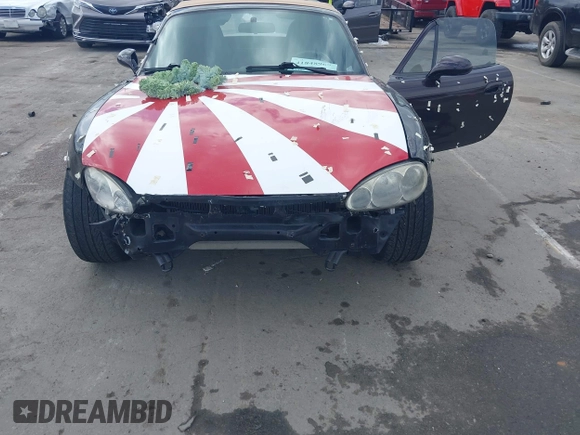 2004 Mazda MX-5 Miata LS with VIN JM1NB353040409951, listed as a IAAI auction lot 41848965 with 125,750 mi miles and . Bid and sale history available at DreamBid. Image 6.