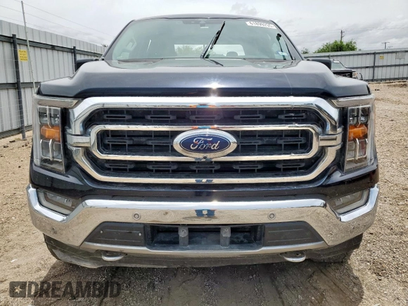 2021 Ford F-150 XL with VIN 1FTFW1E80MFA32611, listed as a Copart auction lot 61899255 with 98,278 mi miles and Salvage title. Bid and sale history available at DreamBid. Image 5.