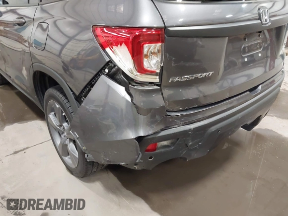 2019 Honda Passport Touring with VIN 5FNYF8H98KB007933, listed as a IAAI auction lot 41953263 with 87,614 mi miles and . Bid and sale history available at DreamBid. Image 6.