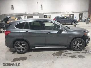 2016 BMW X1 xDrive28i with VIN WBXHT3C3XG5E47536, listed as a IAAI auction lot 41672144 with 97,932 mi miles. Bid and sale history available at carsss.com. Image 13.