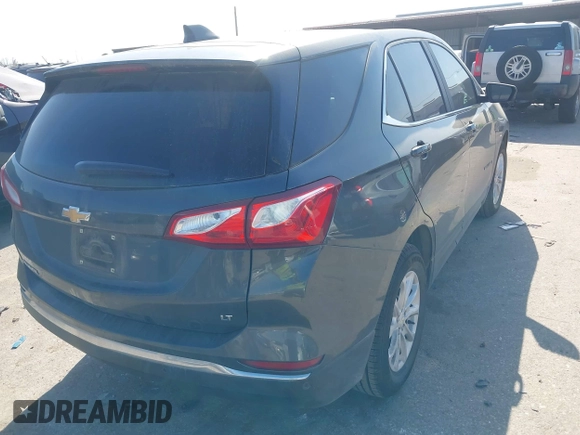 2021 Chevrolet Equinox LT with VIN 3GNAXKEV0ML378657, listed as a IAAI auction lot 41859327 with 51,550 mi miles and . Bid and sale history available at DreamBid. Image 4.