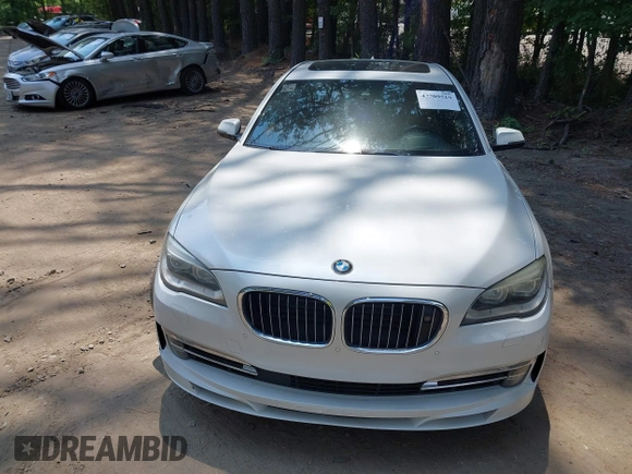 2013 BMW 7 Series 750Li with VIN WBAYE8C55DDS16013, listed as a IAAI auction lot 42709519 with 123,405 mi miles and . Bid and sale history available at DreamBid. Image 12.