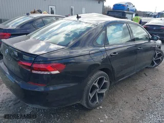2021 Volkswagen Passat 2.0T R-Line with VIN 1VWMA7A35MC016776, listed as a IAAI auction lot 41435818 with 128,341 mi miles. Bid and sale history available at carsss.com. Image 4.