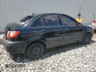 2009 Kia Rio LX with VIN KNADE223296539006, listed as a Copart auction lot 69229394 with 227,766 mi miles and Salvage Title. Bid and sale history available at DreamBid. Image 3.