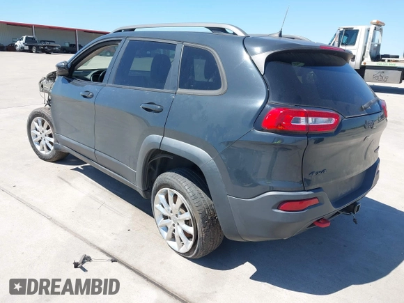 2016 Jeep Cherokee Trailhawk with VIN 1C4PJMBS3GW232519, listed as a IAAI auction lot 41937545 with Not provided miles and . Bid and sale history available at DreamBid. Image 3.
