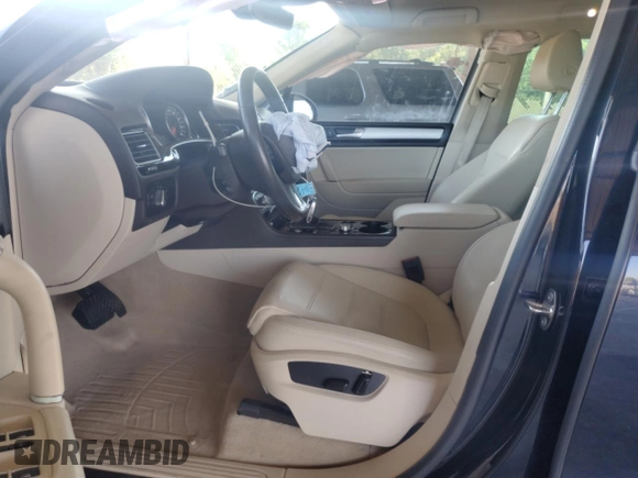 2017 Volkswagen Touareg Sport with VIN WVGEF7BP8HD000237, listed as a Copart auction lot 52714074 with 107,463 mi miles and . Bid and sale history available at DreamBid. Image 7.
