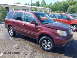 2007 Honda Pilot EX-L with VIN 5FNYF18547B006094, listed as a IAAI auction lot 42297719 with 235,632 mi miles and . Bid and sale history available at DreamBid. Image 1.